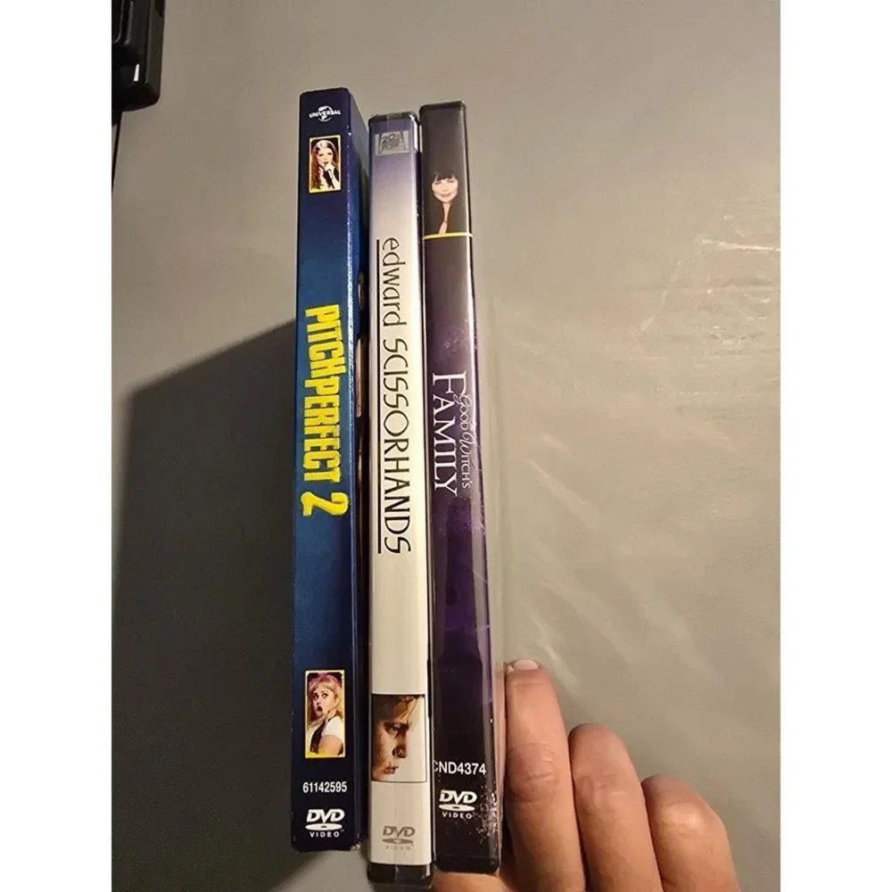 3 DVDS Titles in Description‎